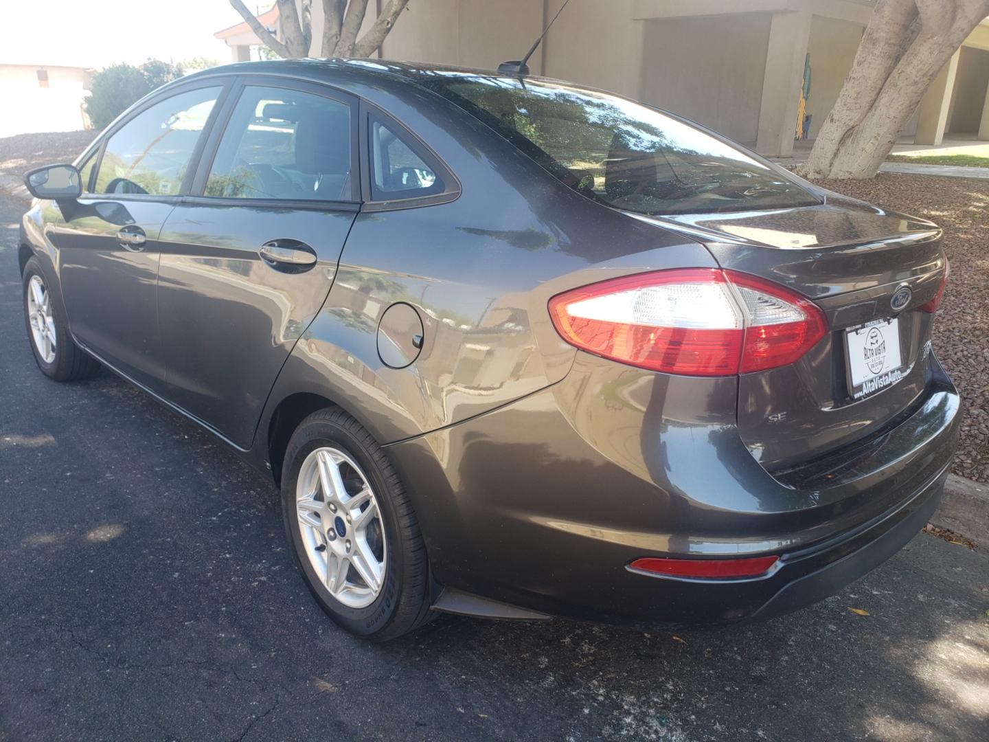 2019 /black Ford Fiesta SE (3FADP4BJ3KM) with an 1.6L L4 DOHC 16V engine, 6-Speed Automatic transmission, located at 323 E Dunlap Ave., Phoenix, AZ, 85020, (602) 331-9000, 33.567677, -112.069000 - 2019 Ford Fiesta SE,.....A Must See!!... No accidents,.... Ice cold AC. The car is gorgeous inside and out. Power windows, Power door locks, Stereo/ CD Player, Phone sync, Bluetooth, Backup camera, Beautiful Black interior with Black cloth seats in near perfect condition, Clean Arizona title , Runs - Photo#5